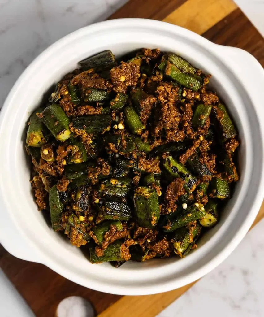 Bhindi okra cooked in stuffed vegetable masala served with paratha